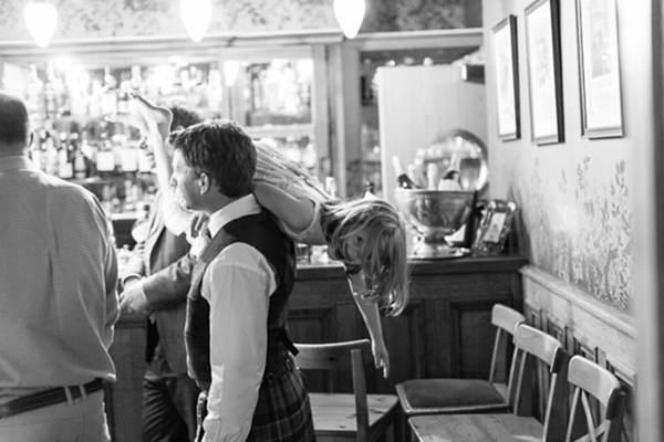dad lifting his daughter