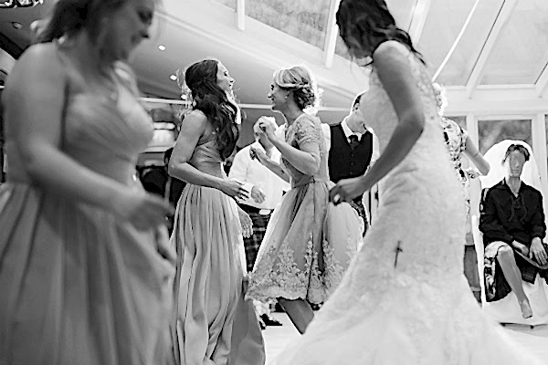 guests dancing in conservatory at the lodge on loch goil