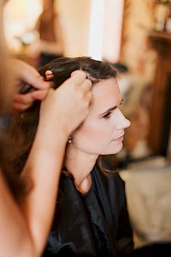 bride having her hair done during wedding at the lodge on loch goil