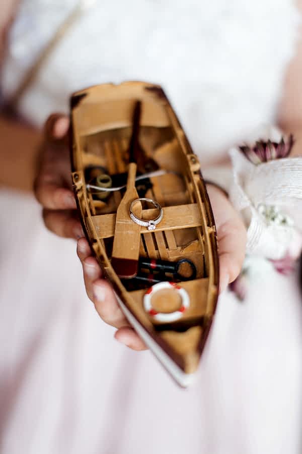 engagement ring on a mdel of a boat
