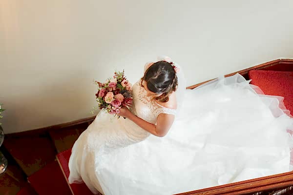 bride walking down stairs at the lodge on loch goil