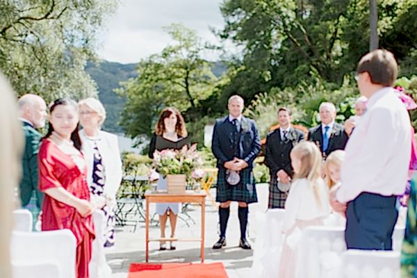 groom and guests waiting at wedding ceremony at the lodge on loch goil