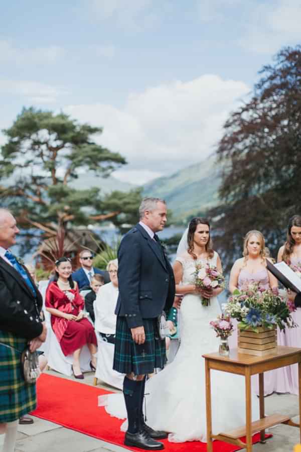 outdoors wedding ceremony at the lodge on loch goil
