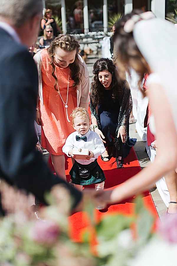 little boy ring bearer in scottish kilt