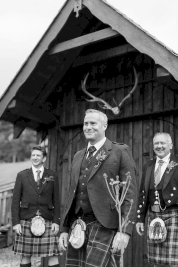 groom with groomsmen at boat house loch goil