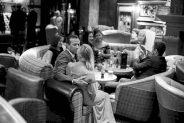 guests relaxing at cameron house hotel bar