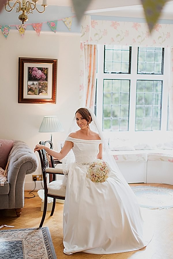 bride sitting on the her chair in the house bearsden glasgow