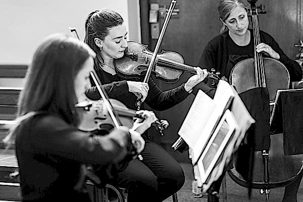 black and white photo of musicians at bearsden church scotland 