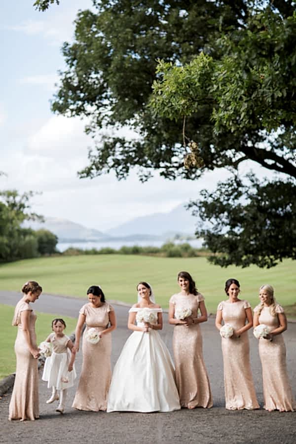bride with bridesmates with a view over loch lomond