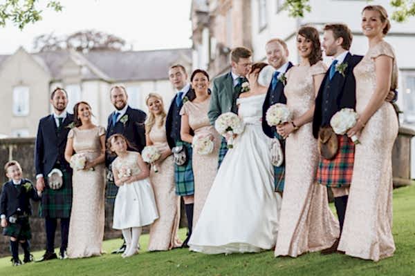 bride and groom kissing wedding photographer glasgow prices