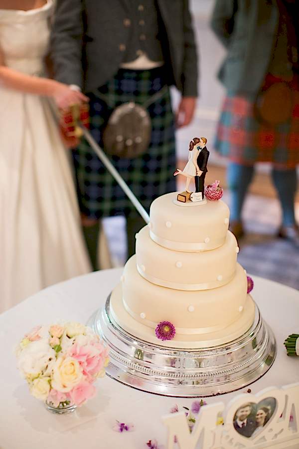 cutting of the cake with cool cake