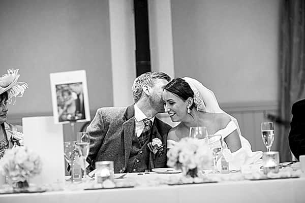 groom kissing bride just after jis speech fotogenic of scotland