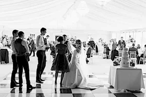 scottish bride talking to her guests at the wedding mar hall 