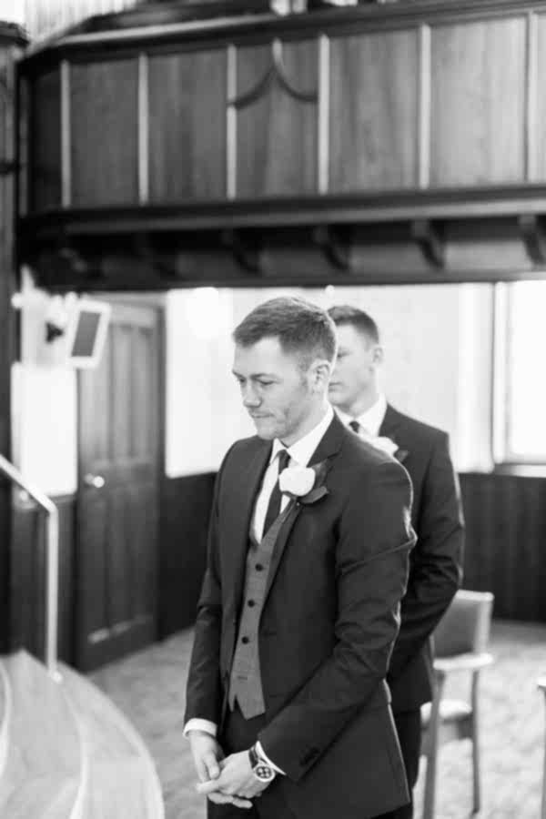 groom waiting at the altra in hamilton church in scotland 