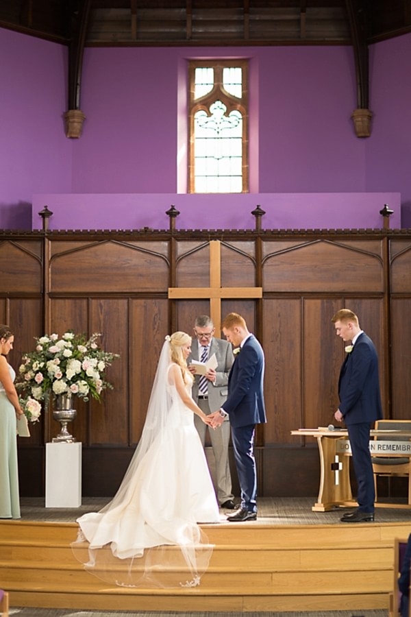 vows exchange in hamilton church in scotland 