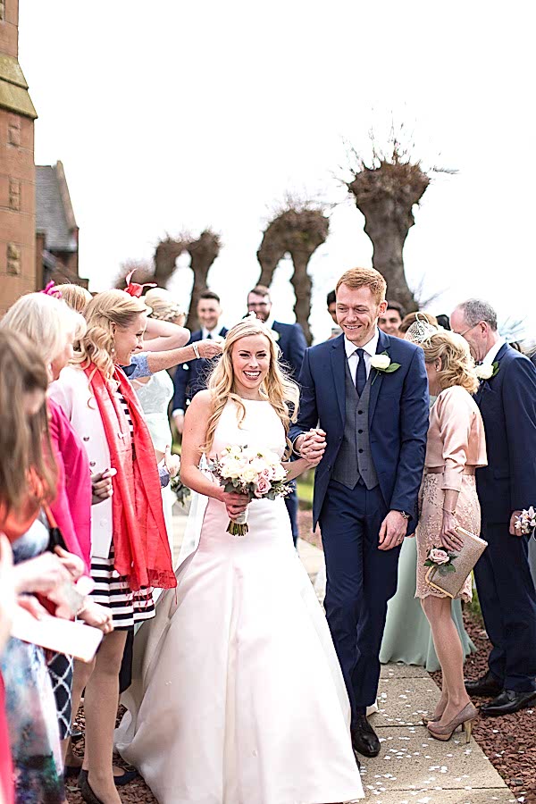 married couple walking after ceremony scotland 