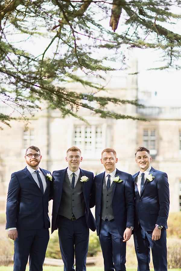 scottish groom with ushers in mar hall garden scotland