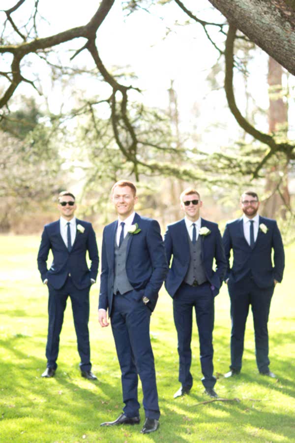groom in focus of wedding photographer scotland