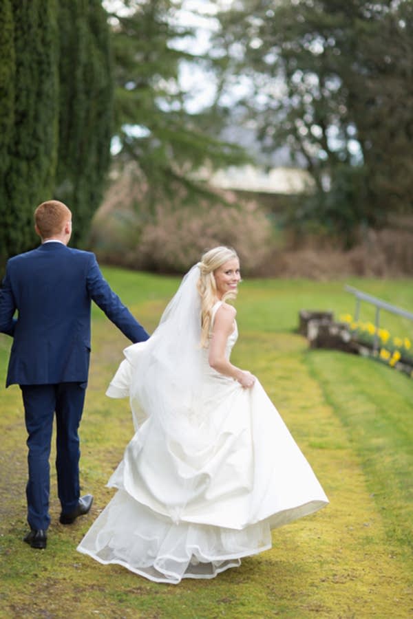 bride turning away looking at photographers scotland 