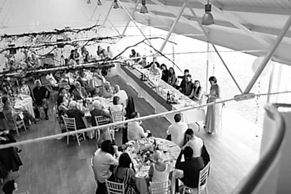 bridesmate speaking during wedding speeches