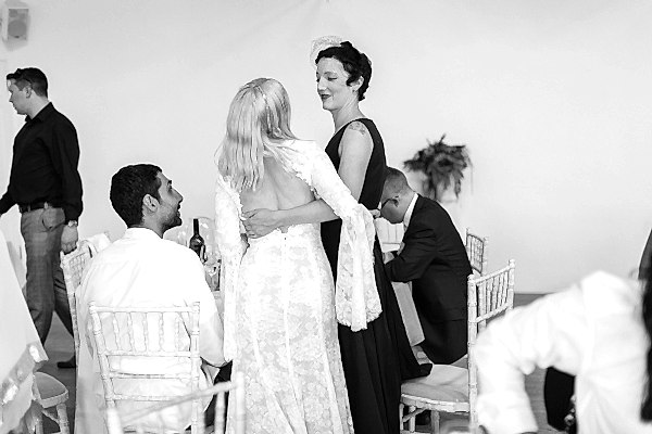 bride speaking with friends
