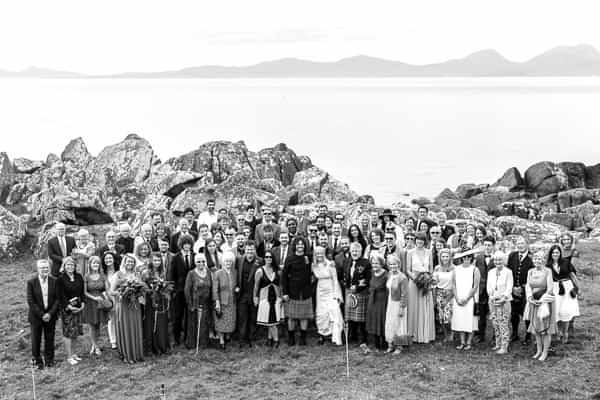 wedding group shoot with family and friends crear beach