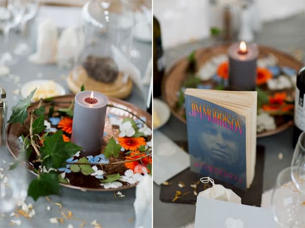 colourful wedding table decorations with candles and books
