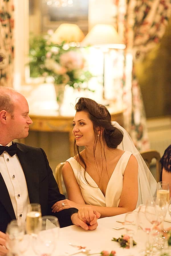 bride looking into groom