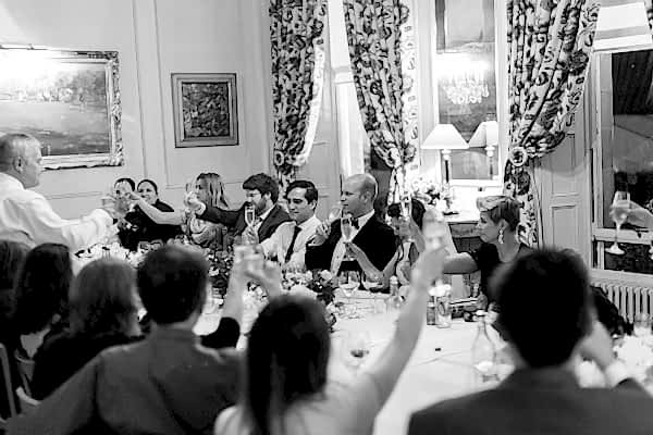 faher of the bride raising toast during his wedding speech