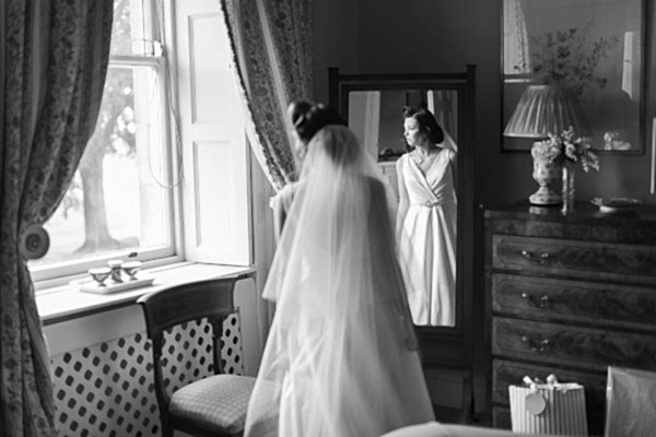 bride looking through the window 