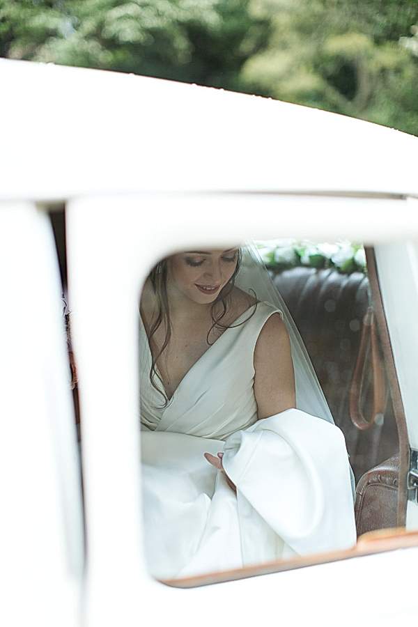 bride in a wedding car going out