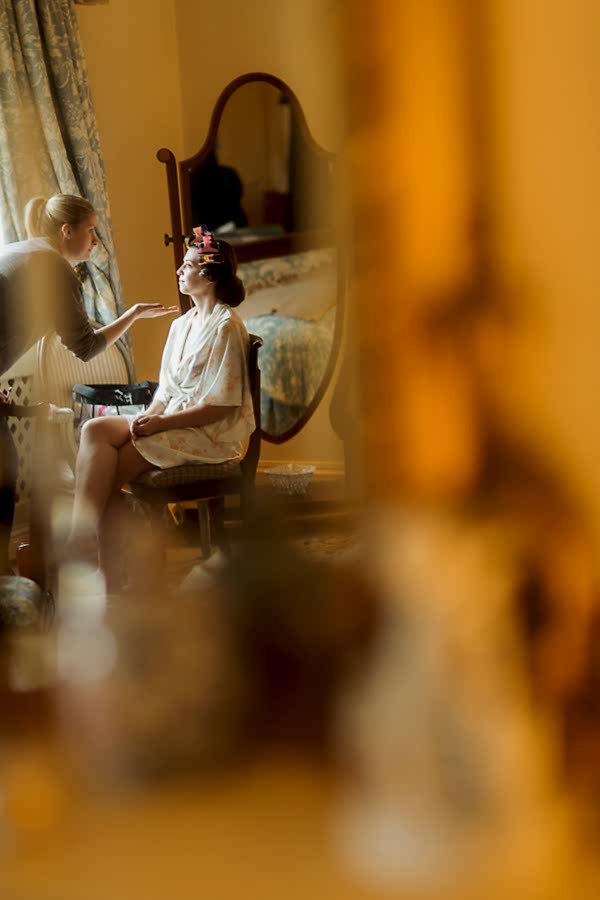 bride having her makeup done at dundas castle scottish wedding venue