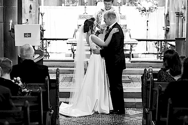 bride and groom looking at each other
