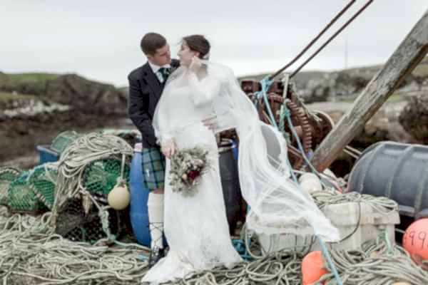 wedding photos scotland newlyweds on an old harbour