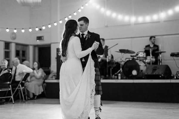 dancing bride and groom