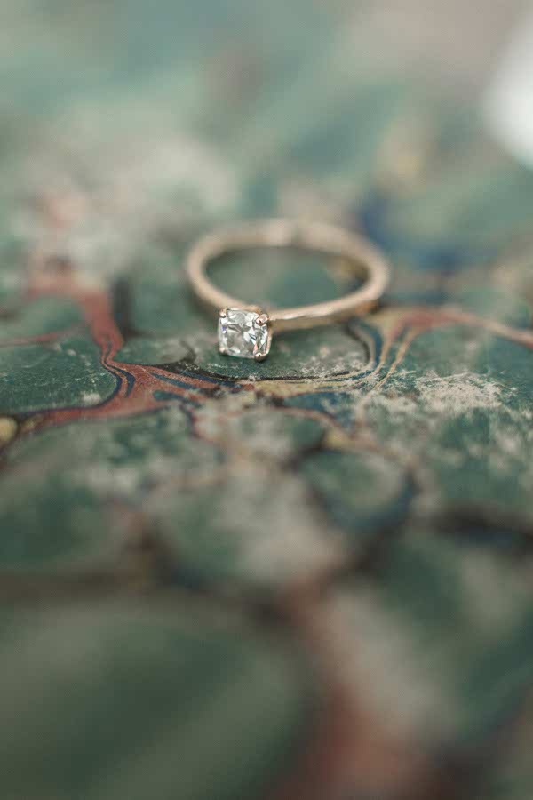 engagament ring on a book