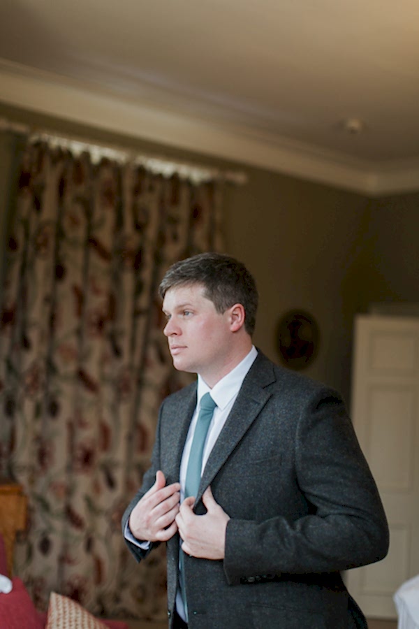 groom getting ready at cromlix 