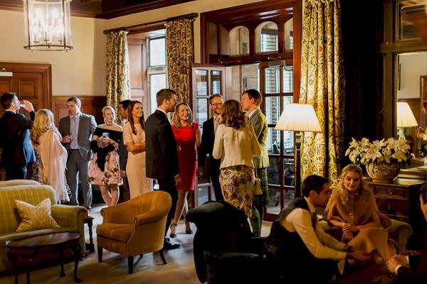 wedding guests chatting at cromlix house 