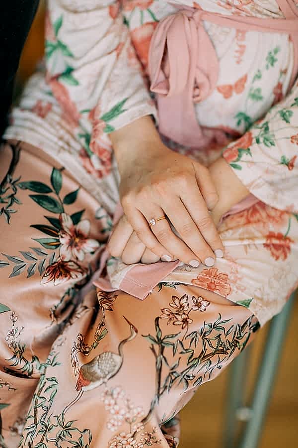 bride wears engagment ring