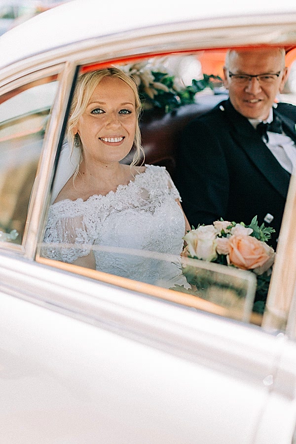 bride arrives at the parish church in helensburgh