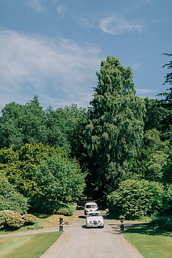 wedding cars arriving at the boturich castle 