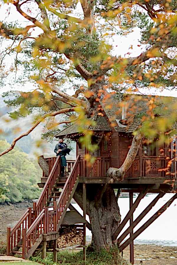 wedding photos the lodge on loch goil piper on the tree house scotland
