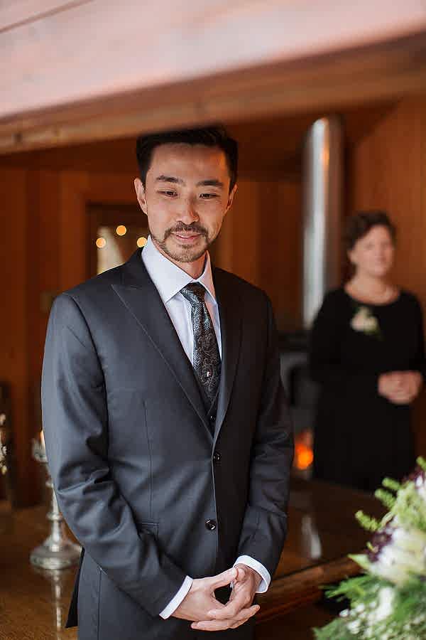 groom waiting at the tree house