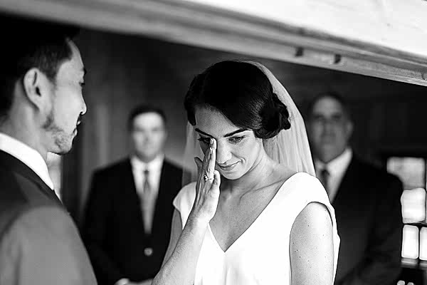 bride emotional during ceremony