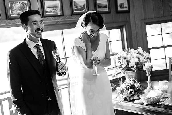 bride and groom laughing after ceremony