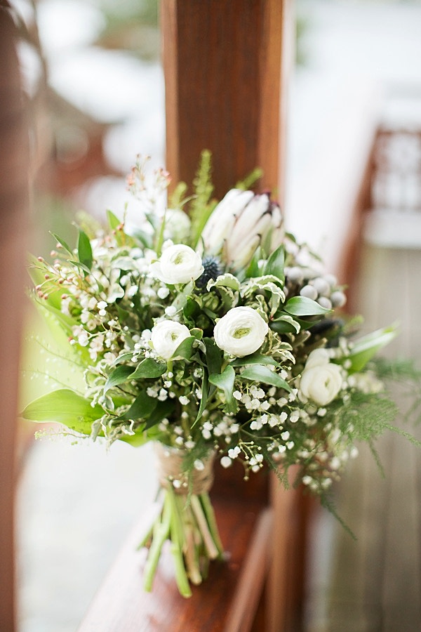 white and green wedding flowers on balcony at the lodeg scotland