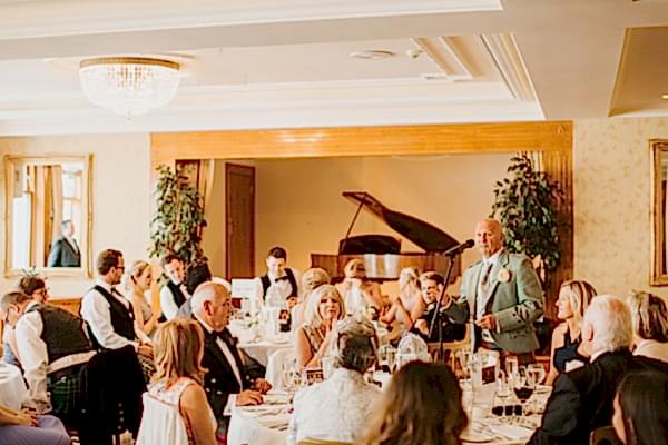 father of the bride starting wedding speeches