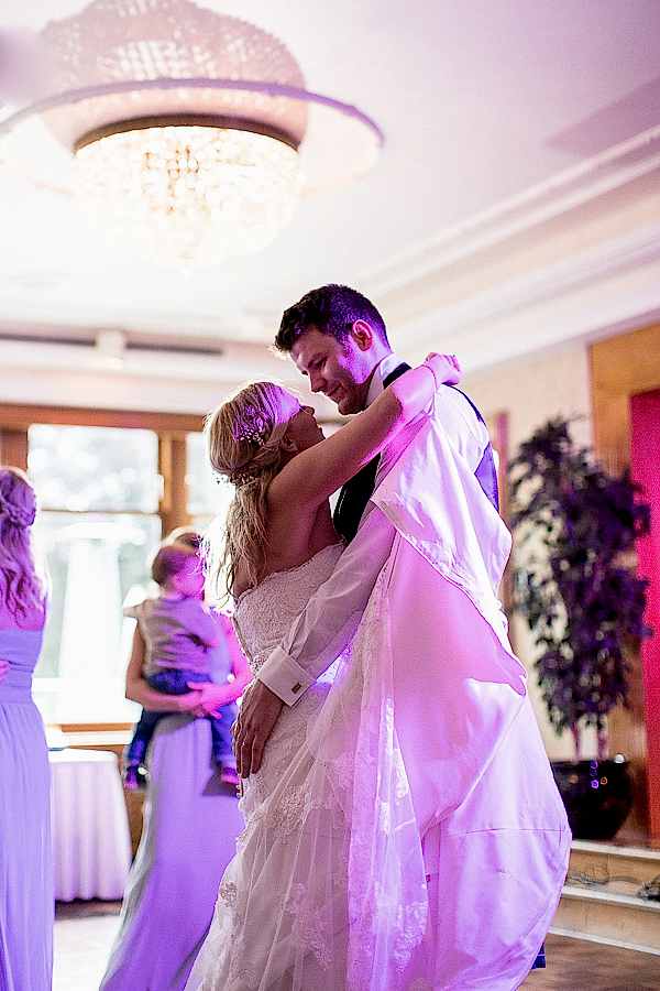 first dance bride and groom embraced