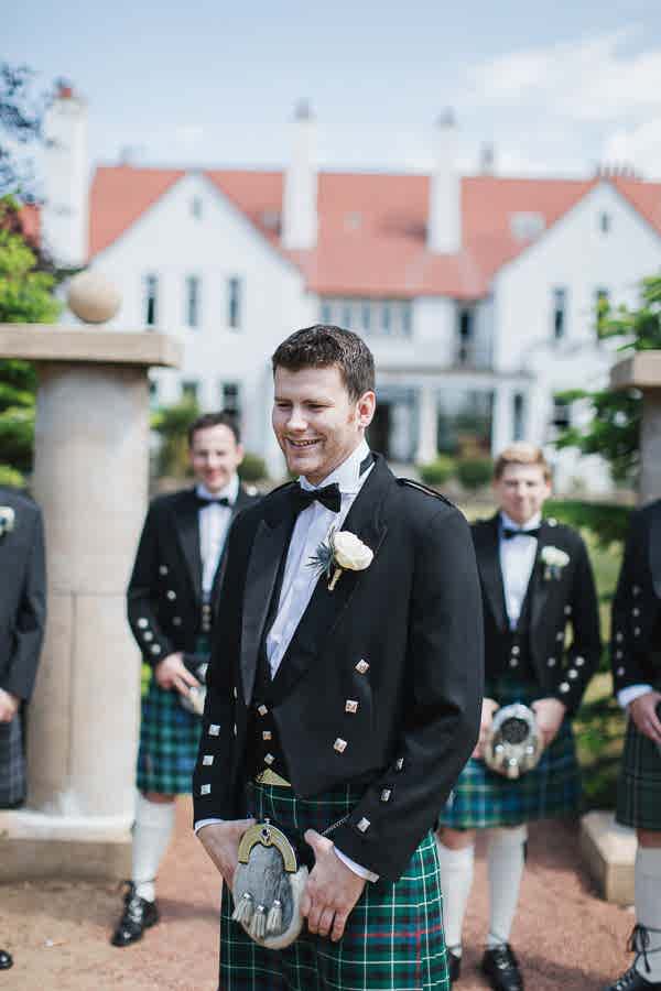 groom and his groomsmen outside the hotel in troon