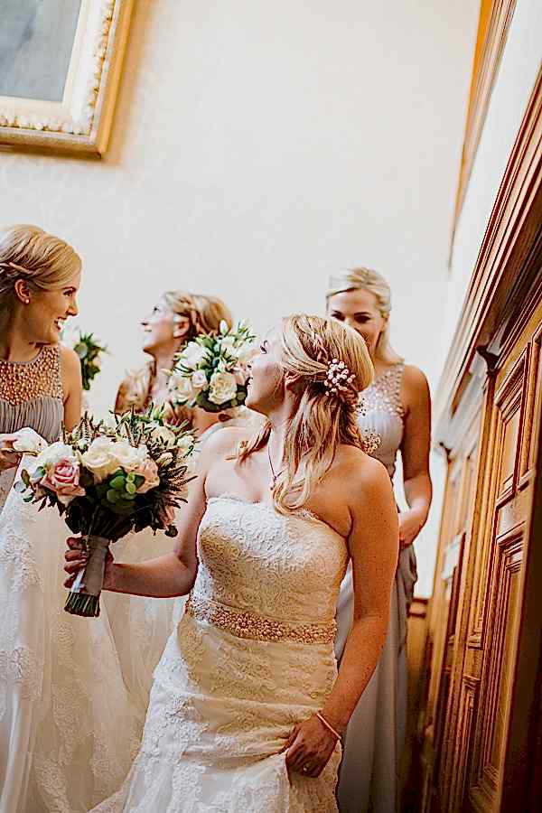 bride walking down the stairs to the wedding ceremony